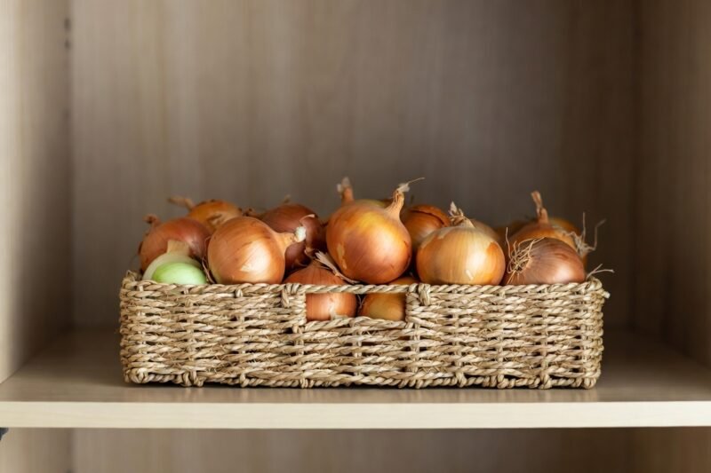 The only way you should store onions, according to a food editor